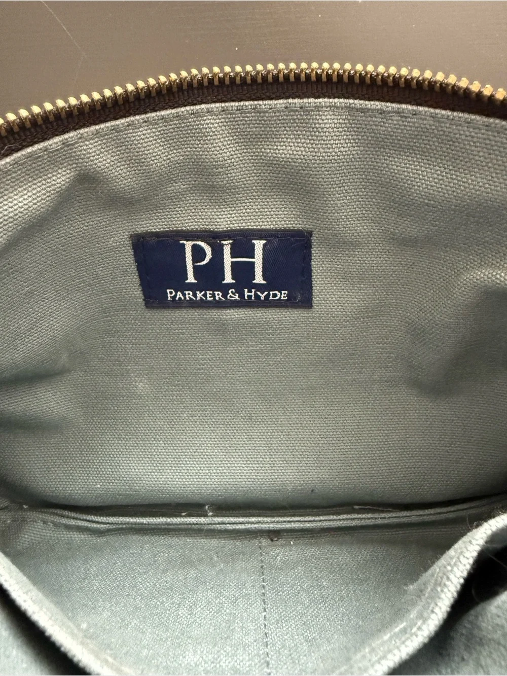 Parker & Hyde brown and beige snake print clutch purse. Dallas based company